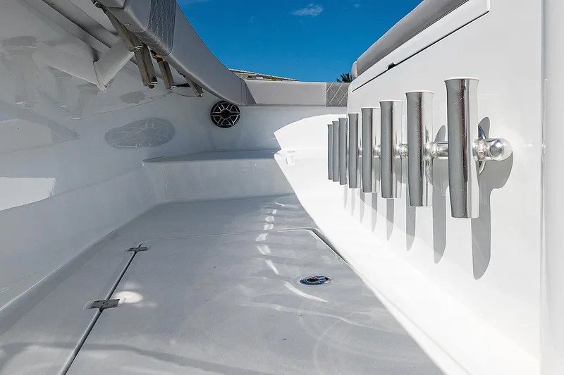 Slide: The Image of 2019 Freeman 37 boat interior with rod holders and clean white deck. - 11