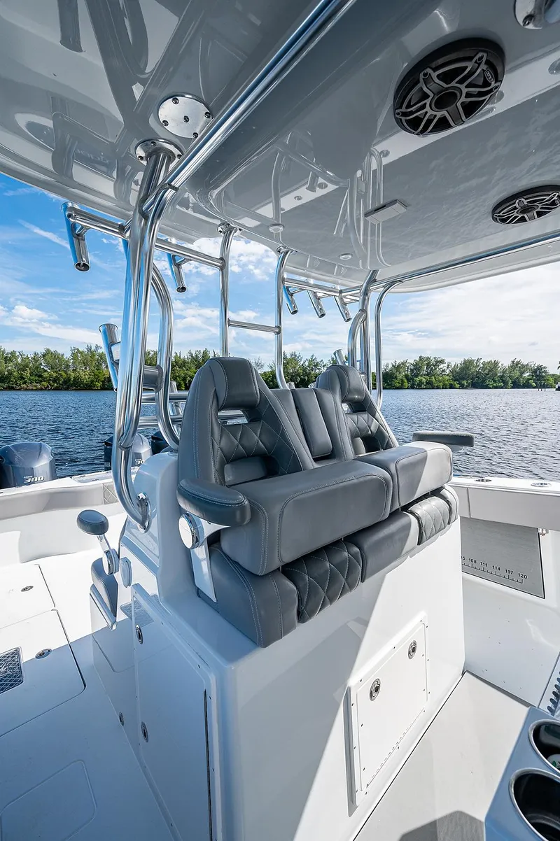 Slide: The Image of 2019 Freeman 37 boat interior with luxury seating and water view. - 17