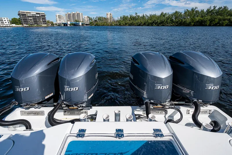 Slide: The Image of Freeman 37 boat with quad Yamaha 300 engines on a scenic waterway, 2019 model. - 22