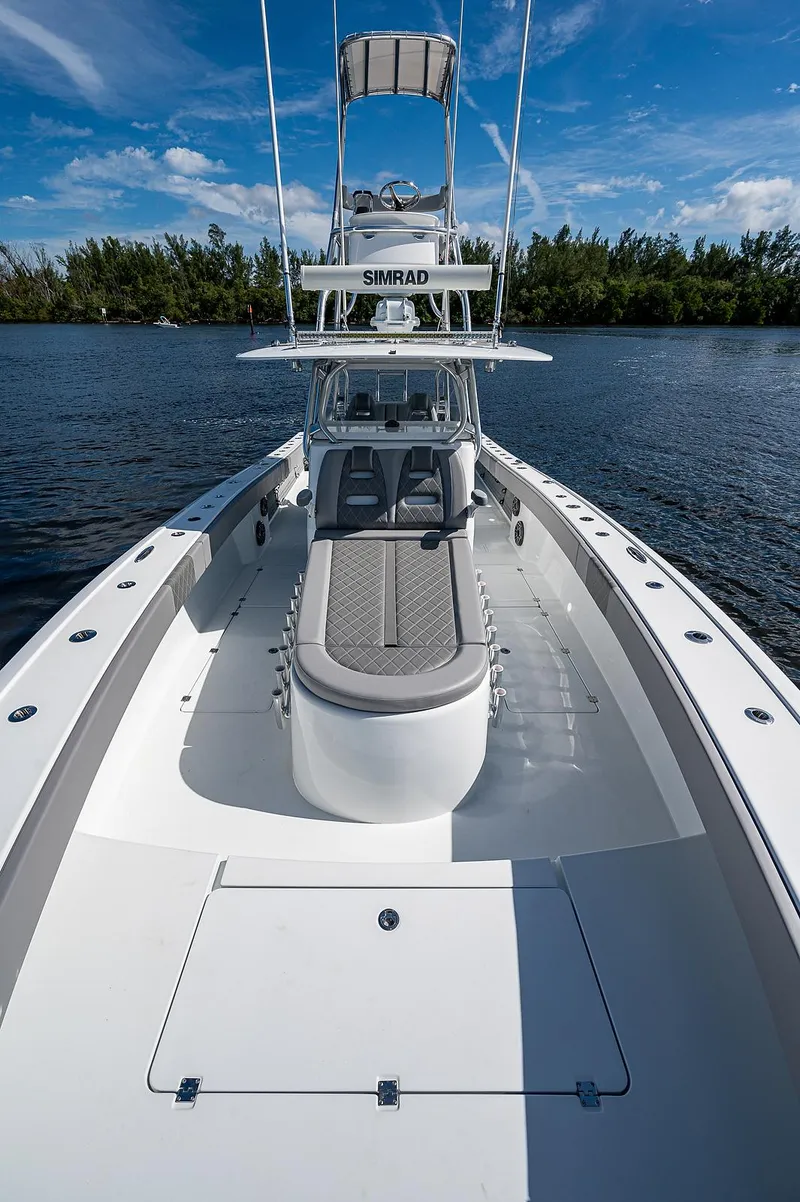 Slide: The Image of 2019 Freeman 37 boat on calm water with clear blue sky. - 29