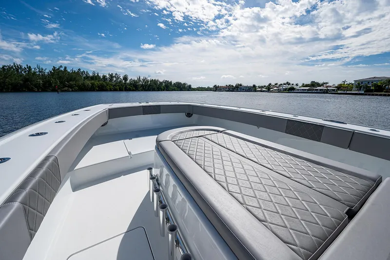 Slide: The Image of Freeman 37 boat 2019 model on calm water with clear sky background. - 33