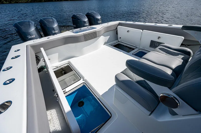 Slide: The Image of Freeman 37 boat 2019 model with four 300 HP engines, spacious deck, and seating. - 35