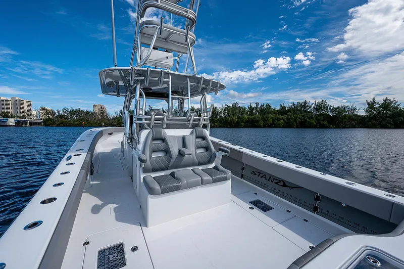 Slide: The Image of Freeman 37 boat interior, 2019 model, on a calm water body with clear sky. - 6