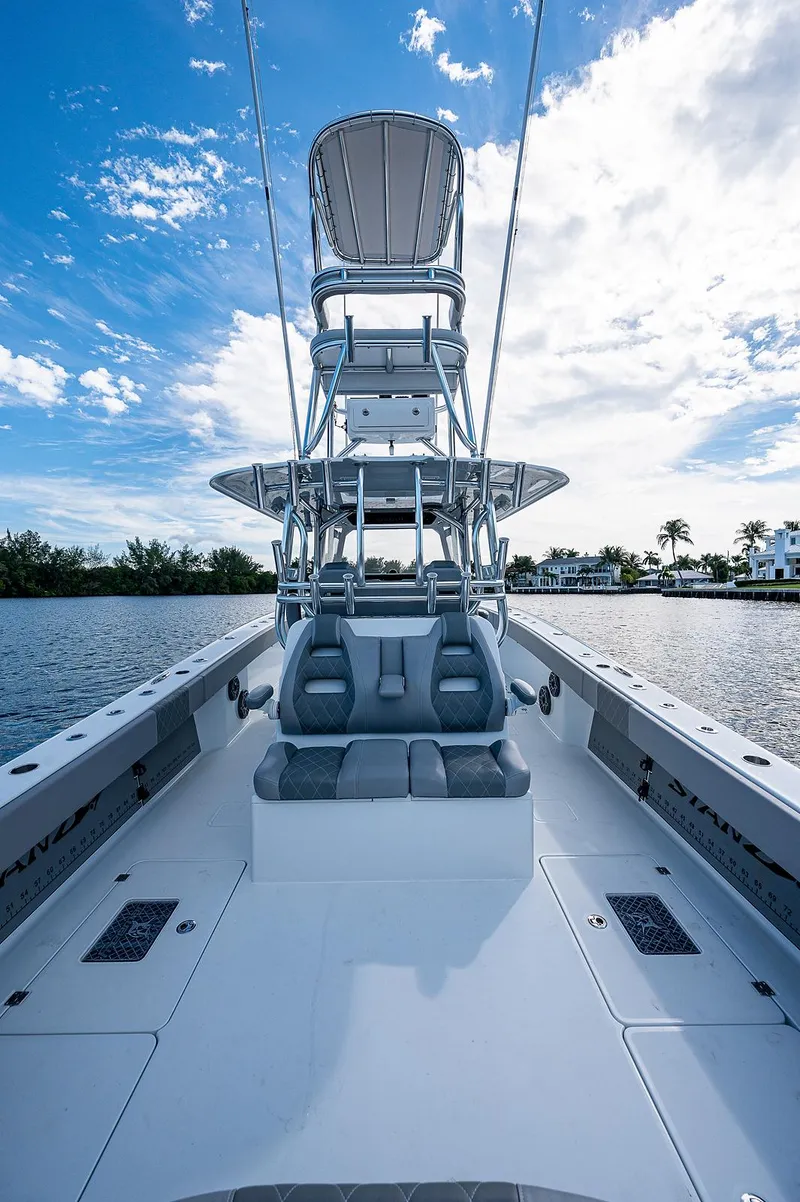Slide: The Image of 2019 Freeman 37 boat with dual seating and tower on calm water. - 8