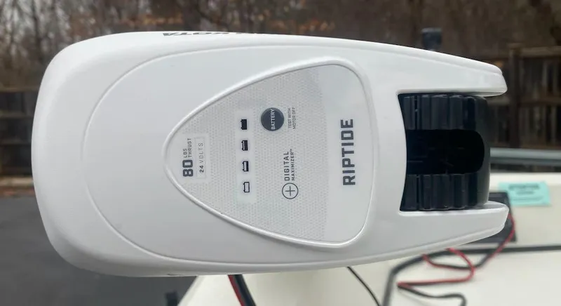 Slide: The Image of 2024 Ranger RB190 boat with Riptide trolling motor, featuring digital controls. - 14