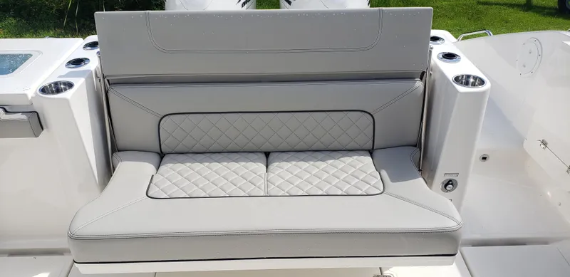 Slide: The Image of 2024 Pursuit S 358 Sport boat with luxurious quilted seating. - 13