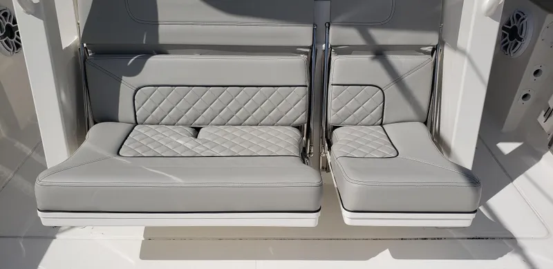 Slide: The Image of 2024 Pursuit S 358 Sport boat with luxurious gray seating. - 21