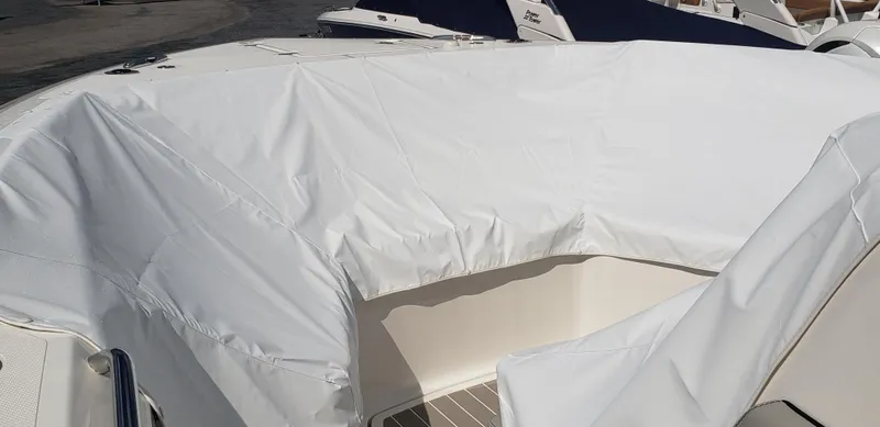 Slide: The Image of 2024 Pursuit S 358 Sport boat with protective cover. - 23