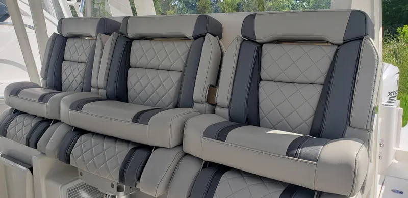 Slide: The Image of 2024 Pursuit S 358 Sport boat seats with diamond-stitched upholstery. - 25