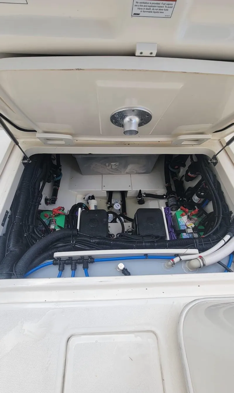 Slide: The Image of Engine compartment of 2021 Boston Whaler 320 Vantage. - 15