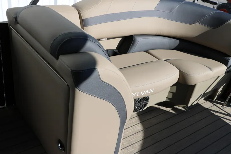 Slide: The Image of 2024 Sylvan L3 RLZ boat interior with beige and gray seating. - 32