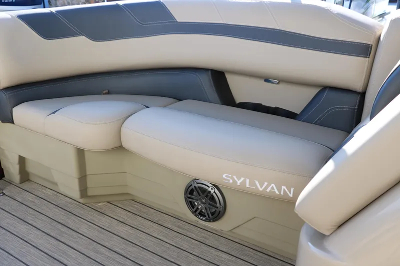 Slide: The Image of 2024 Sylvan L3 RLZ boat interior with beige and gray seating. - 34