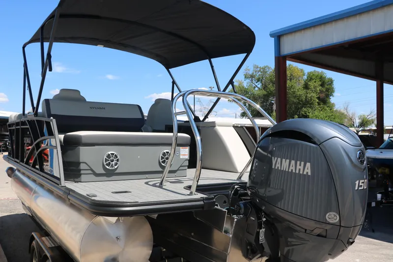Slide: The Image of 2025 Sylvan X1 CLZ DH Tri-Toon boat with Yamaha 150 engine. - 4