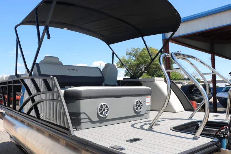 Slide: The Image of 2025 Sylvan X1 CLZ DH Tri-Toon boat with seating and canopy. - 6