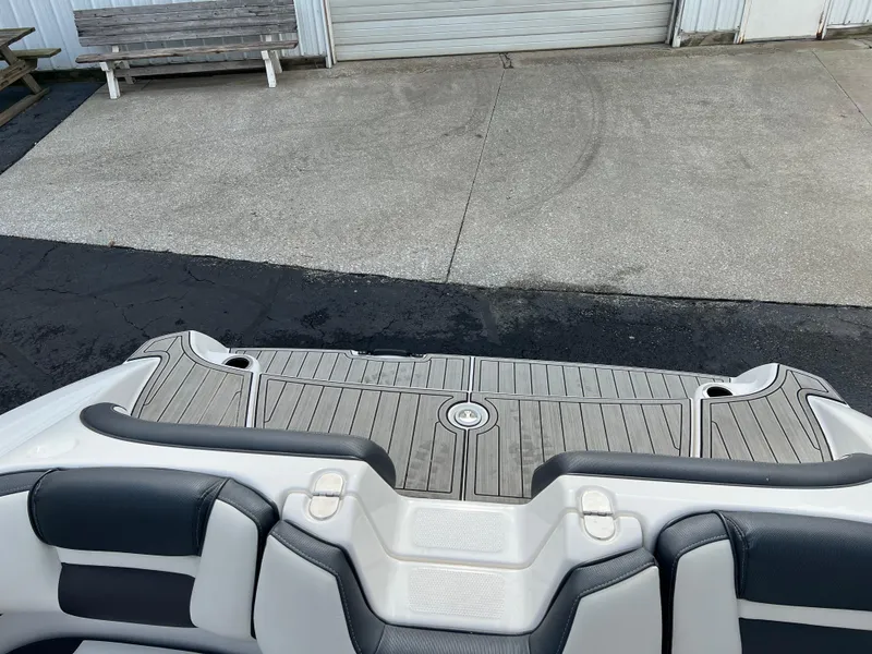 Slide: The Image of 2021 Yamaha Boats AR 195 rear deck and seating area. - 3