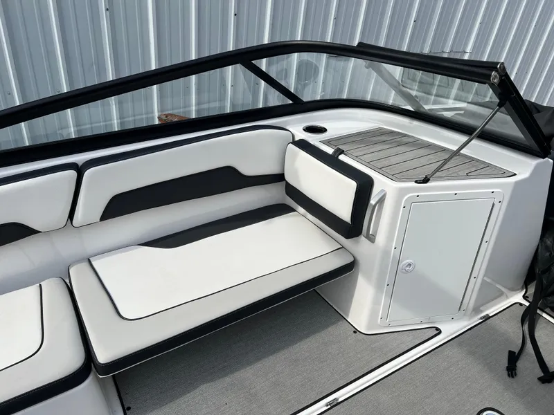 Slide: The Image of 2021 Yamaha Boats AR 195 interior seating and storage area. - 6