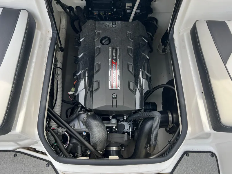 Slide: The Image of 2021 Yamaha Boats AR 195 engine compartment with clean, organized layout. - 8