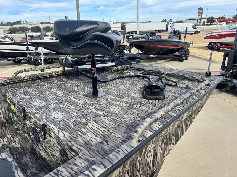 Slide: The Image of 2024 Havoc Boats 1756 FRRSCST fishing boat with camo pattern and swivel seat. - 8