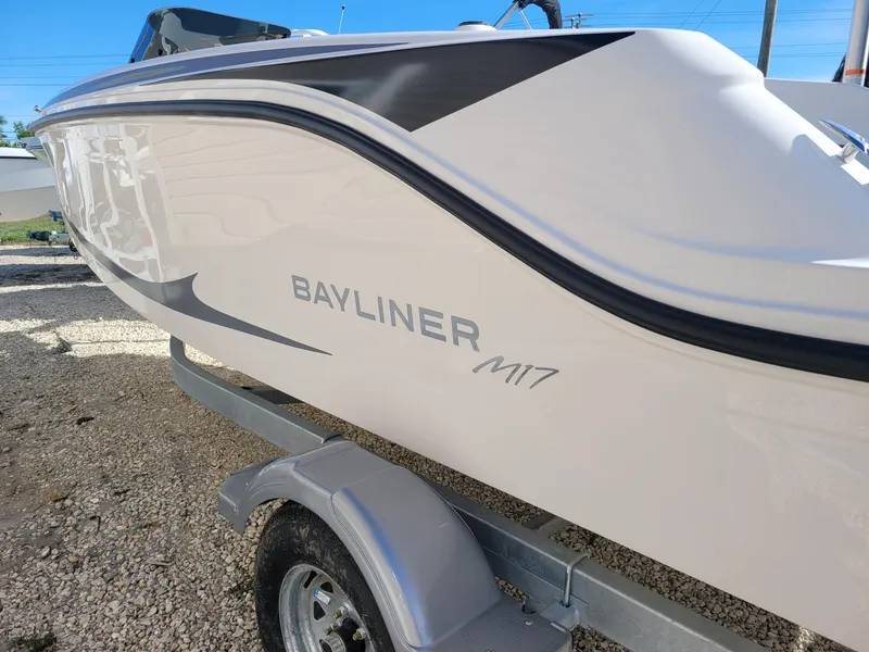 Slide: The Image of 2024 Bayliner M17 boat on trailer, side view. - 14
