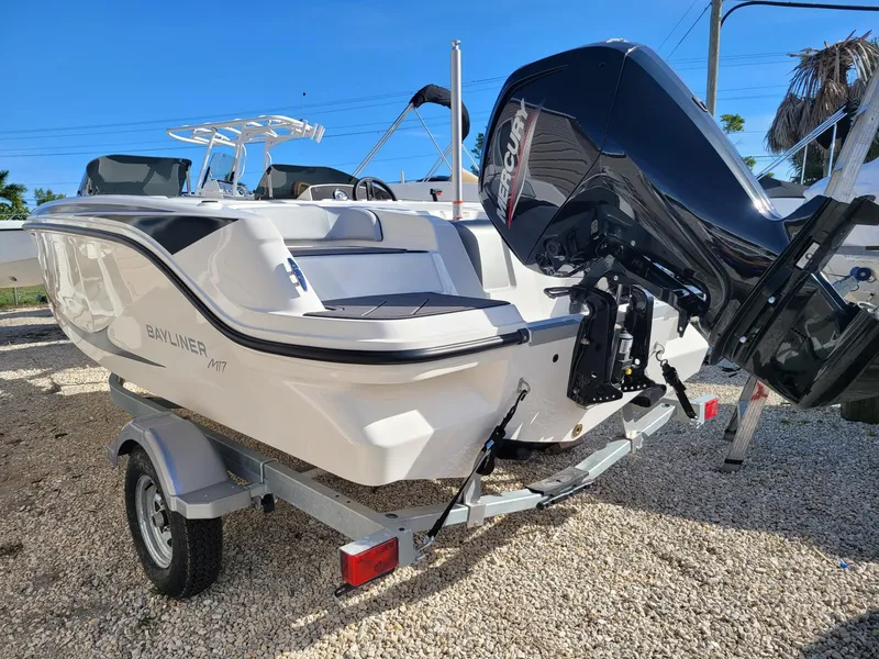 Slide: The Image of 2024 Bayliner M17 boat on trailer with outboard motor. - 4