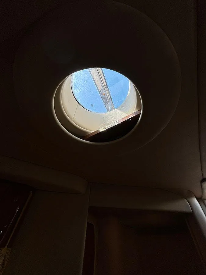 Slide: The Image of Circular skylight inside 2001 Sea Ray 410 Sundancer yacht. - 24
