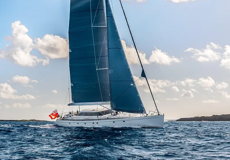 The Image of Jongert 2900M 2005 sailing yacht on open water with blue sails. - 0