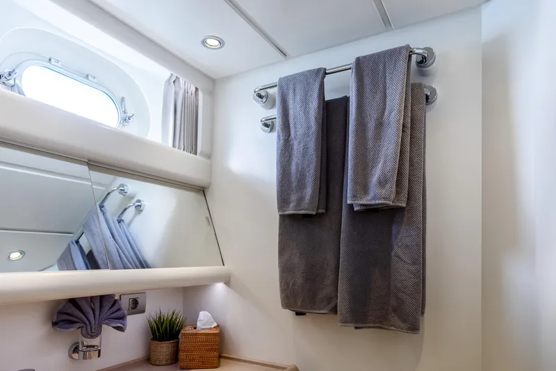 Slide: The Image of Luxury bathroom on 2005 Jongert 2900M yacht with towels and porthole window. - 10