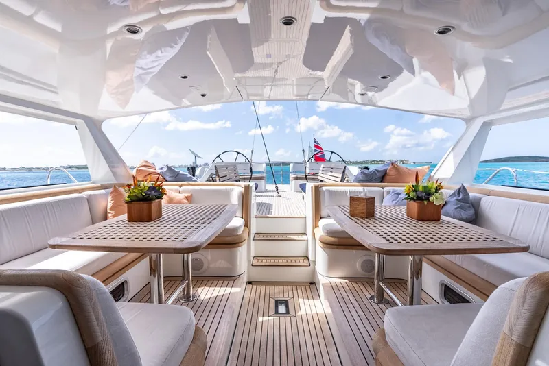 Slide: The Image of Luxurious 2005 Jongert 2900M yacht interior with elegant seating and ocean view. - 5