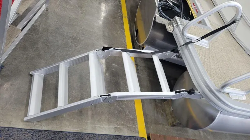 Slide: The Image of Bennington 20 SL 2024 boat with foldable aluminum ladder. - 13