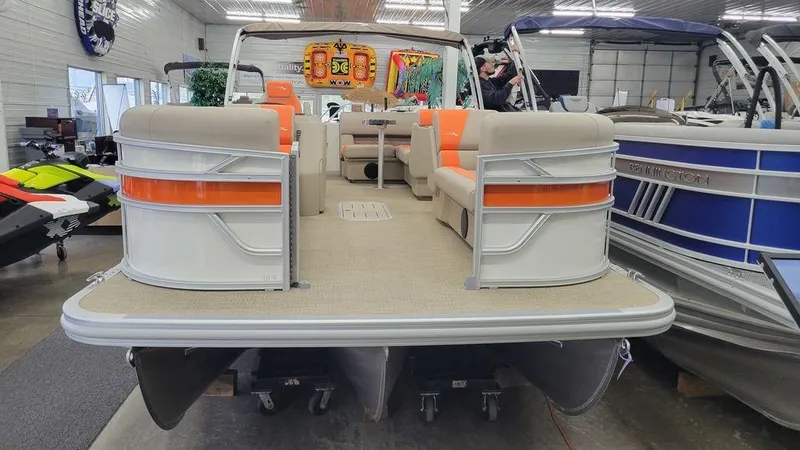 Slide: The Image of 2024 Bennington 20 SL pontoon boat in showroom. - 14