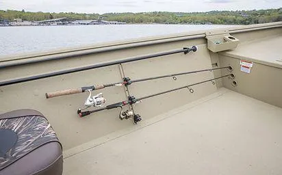 Slide: The Image of 2024 Crestliner 1660 Retriever SC boat interior with fishing rods secured. - 17