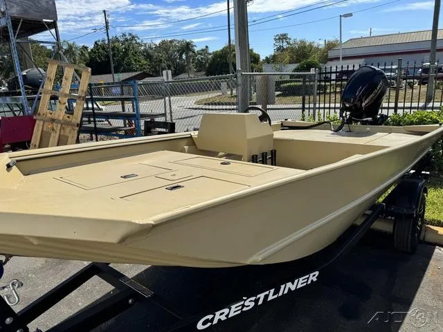 Slide: The Image of 2024 Crestliner 1660 Retriever SC boat on trailer, parked outdoors. - 3