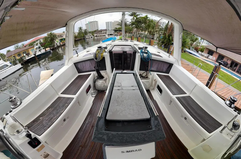 Slide: The Image of Beneteau Oceanis 48 cockpit, 2012 model, featuring spacious seating and modern design. - 12