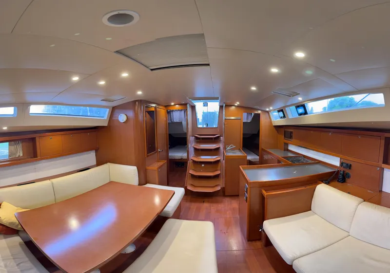 Slide: The Image of Luxurious interior of 2012 Beneteau Oceanis 48 yacht with modern furnishings and spacious layout. - 17