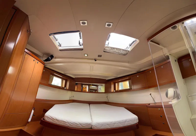 Slide: The Image of Luxurious interior of 2012 Beneteau Oceanis 48 yacht with spacious cabin and skylights. - 27