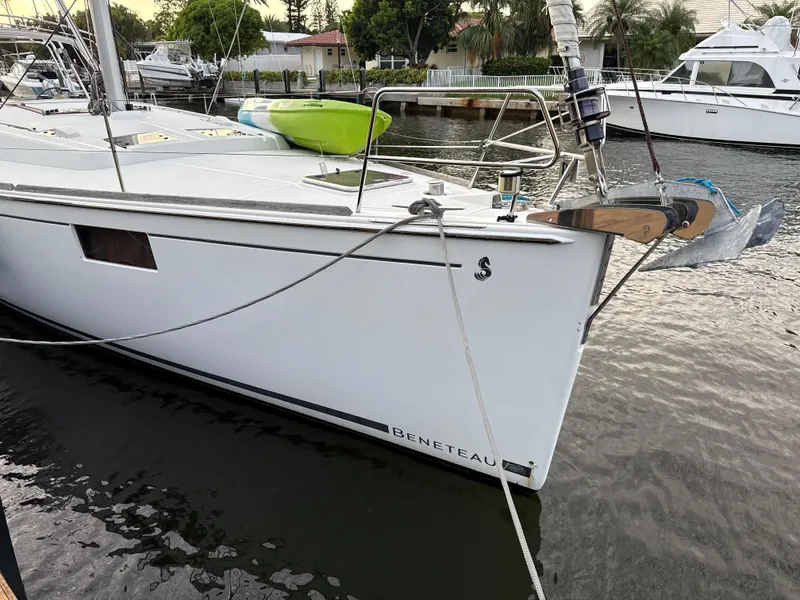 Slide: The Image of 2012 Beneteau Oceanis 48 sailboat docked, featuring sleek design and modern amenities. - 3