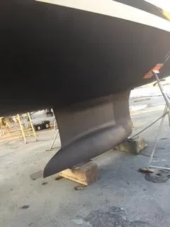 Slide: The Image of Beneteau Oceanis 48 (2012) sailboat keel in dry dock for maintenance. - 36