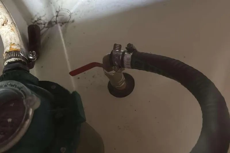 Slide: The Image of Close-up of plumbing components on a 2012 Beneteau Oceanis 48 yacht. - 44