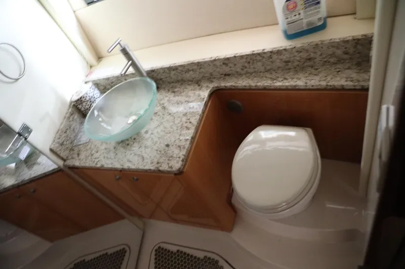 Slide: The Image of 2008 Cobalt 46 yacht bathroom with granite countertop and modern fixtures. - 27