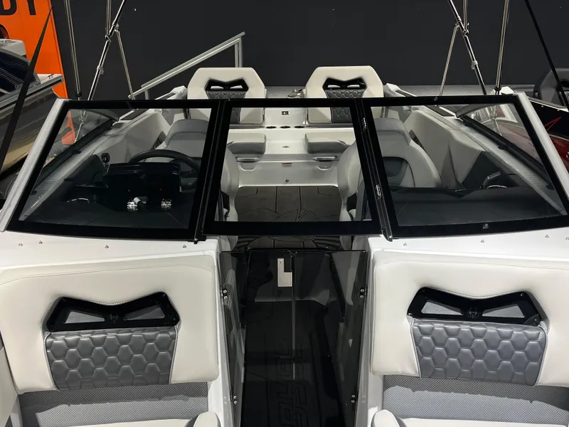 Slide: The Image of 2024 Scarab 235 ID boat interior with modern seating and sleek design. - 7