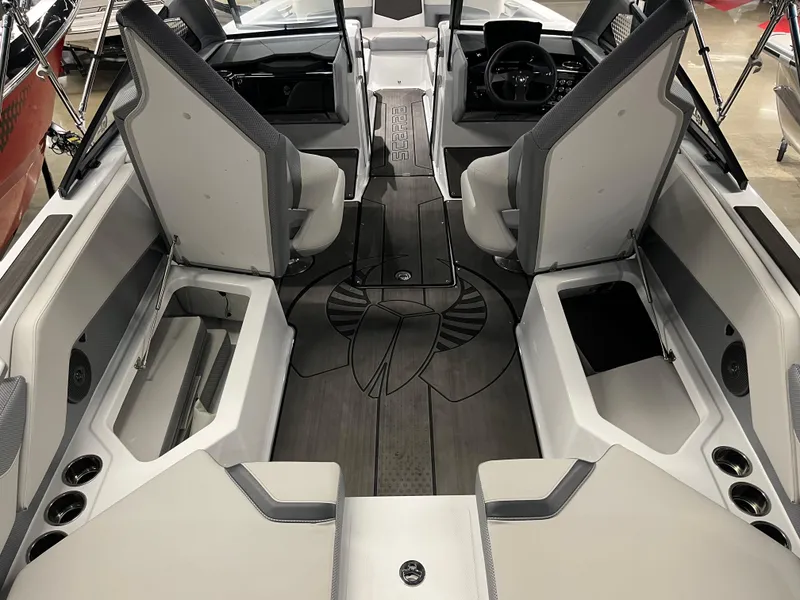 Slide: The Image of 2024 Scarab 235 ID boat interior with modern seating and sleek design. - 8