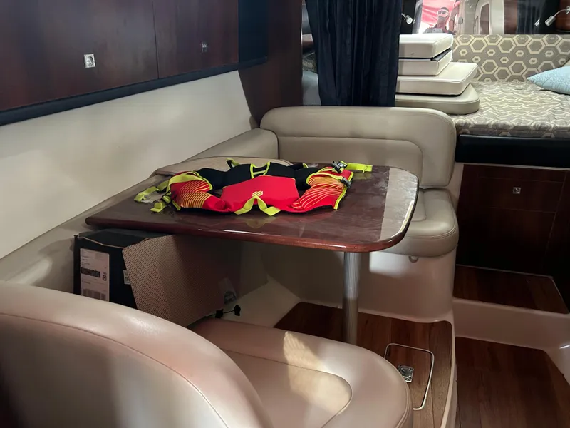 Slide: The Image of Interior of 2016 Chaparral 290 Signature boat with dining area and seating. - 32