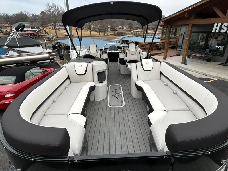 Slide: The Image of 2024 Avalon LSZ 2585 RL pontoon boat with spacious seating and modern design. - 10