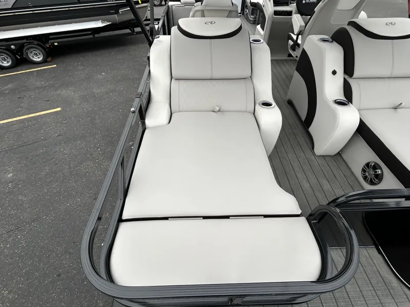 Slide: The Image of 2024 Avalon LSZ 2585 RL boat with luxurious white seating. - 24