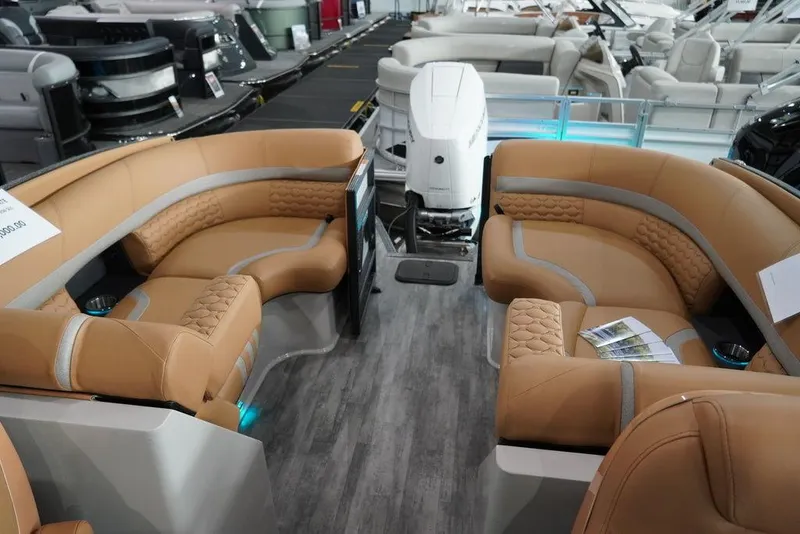 Slide: The Image of 2024 Crest Continental 250 SLC CP3 boat interior with tan seating and modern design. - 12