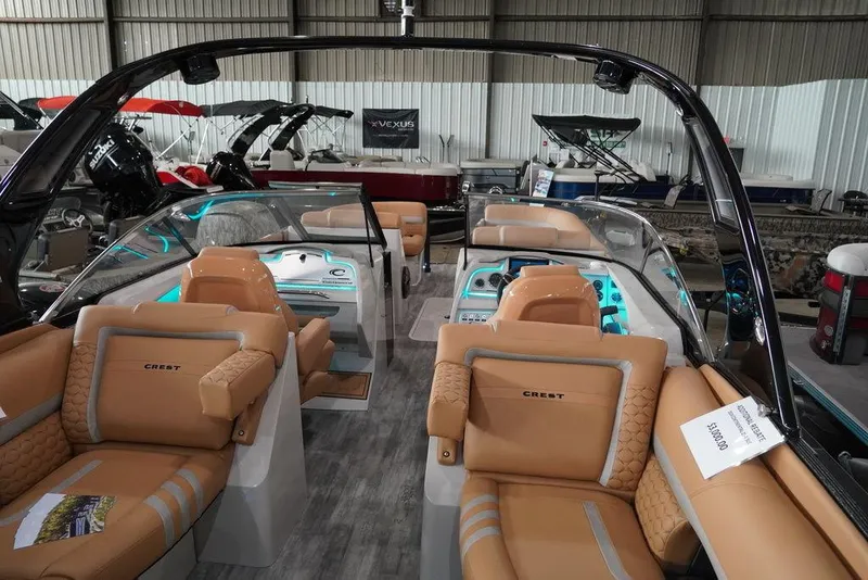 Slide: The Image of 2024 Crest Continental 250 SLC CP3 boat interior with tan leather seats. - 13