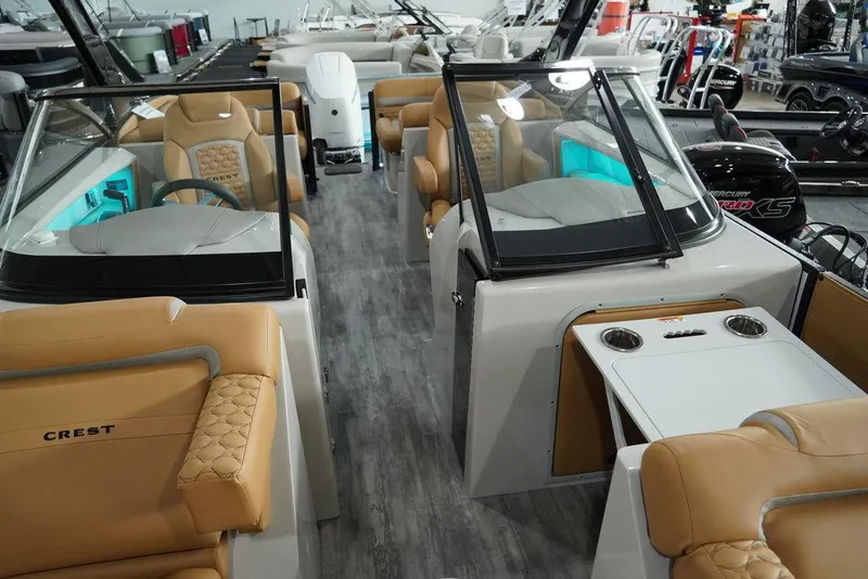 Slide: The Image of 2024 Crest Continental 250 SLC CP3 boat interior with tan leather seats and modern design. - 4