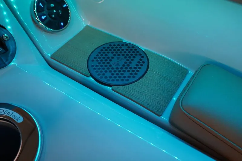 Slide: The Image of 2024 Crest Continental 250 SLC CP3 interior detail with illuminated speaker and cup holder. - 9