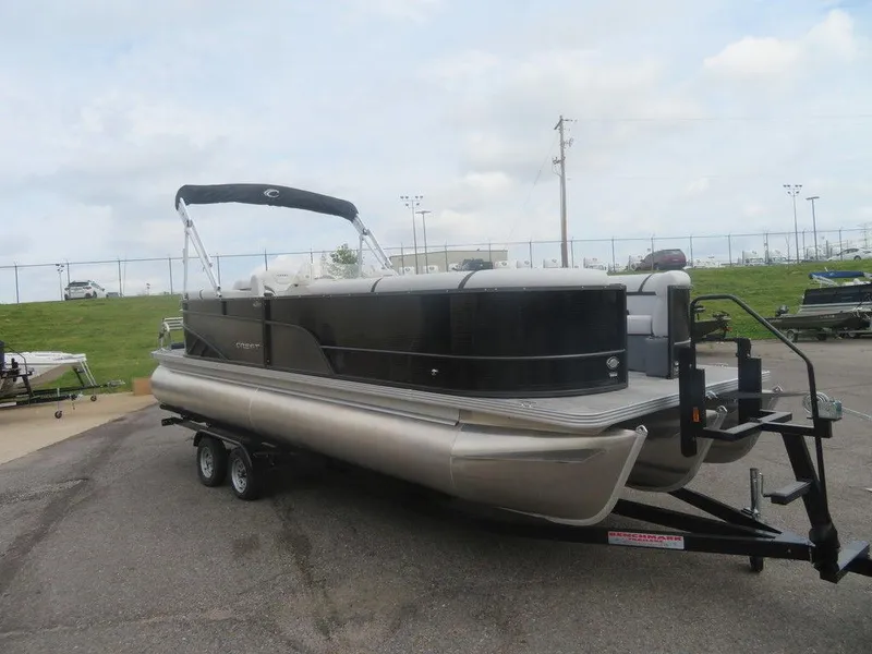 Slide: The Image of 2024 Crest CLASSIC LX 240 SLC pontoon boat on a trailer. - 3