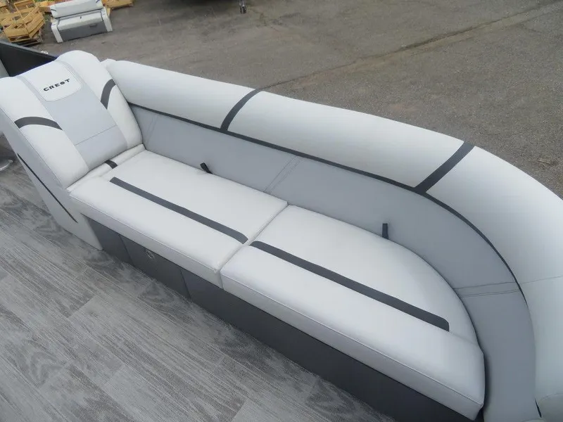 Slide: The Image of 2024 Crest CLASSIC LX 240 SLC boat with luxurious white seating. - 5